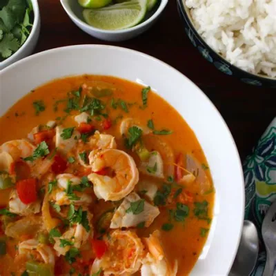  Moqueca! A Soul-Warming Brazilian Seafood Stew Bursting With Aromatic Herbs and Tangy Lime